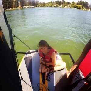 Teenager sailing inflatable sailboat tiwal 3