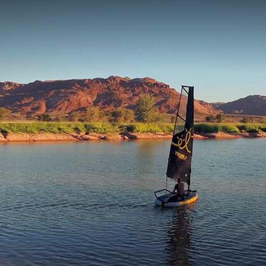 Inflatable sailboat Tiwal 3 sailing in Namibian dramatic landscapes