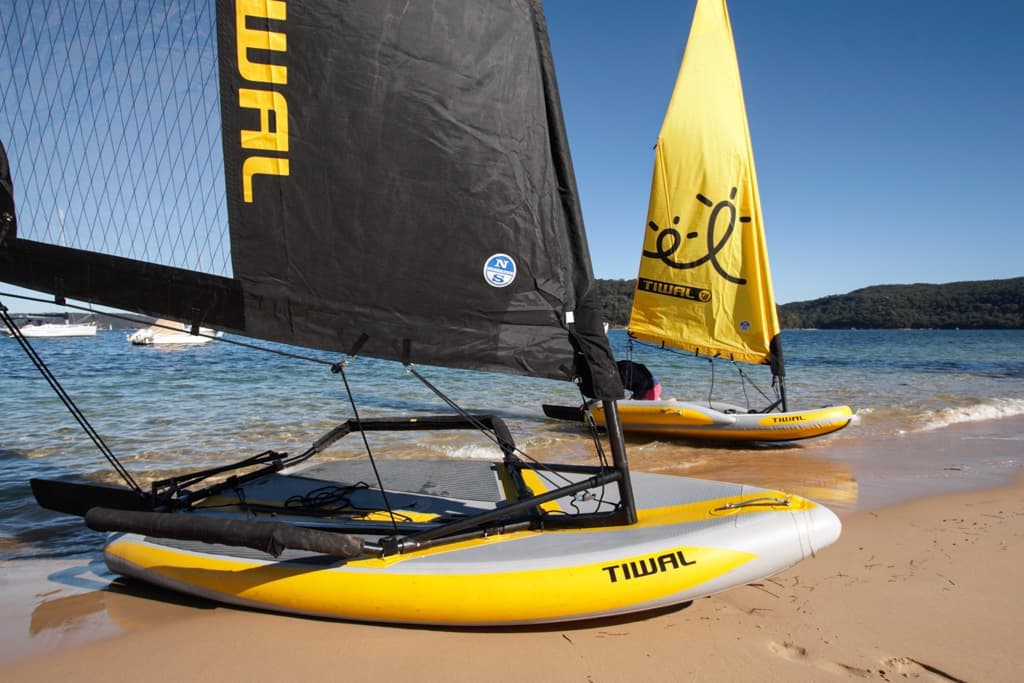 Both Tiwal 2 and 3 Sailboats beached in Pittwater