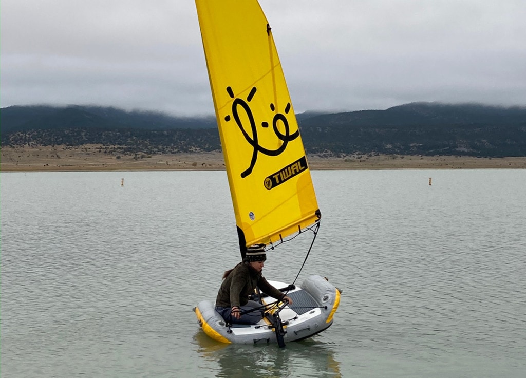 A Tiwal 2 sailing dinghy on a lake in New Mexico