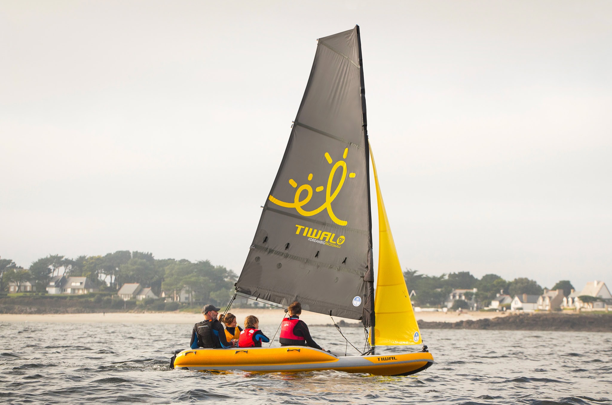 Sailing a family cruiser dinghy boat