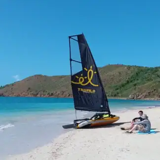 Tiwal 3 > Customer Reviews > Maureen & Pete > Images – 2 – Beached sailing dinghy in the British Virgin Islands Beached sailing dinghy in the British Virgin Islands