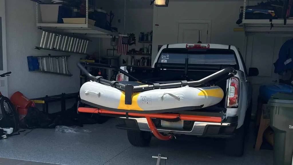FAQ | How do Tiwal Captains Transport their Tiwal? | Tiwal sailboat’s hull in a GMC Canyon pickup’s truck bed Tiwal sailboat's hull in a GMC Canyon pickup's truck bed