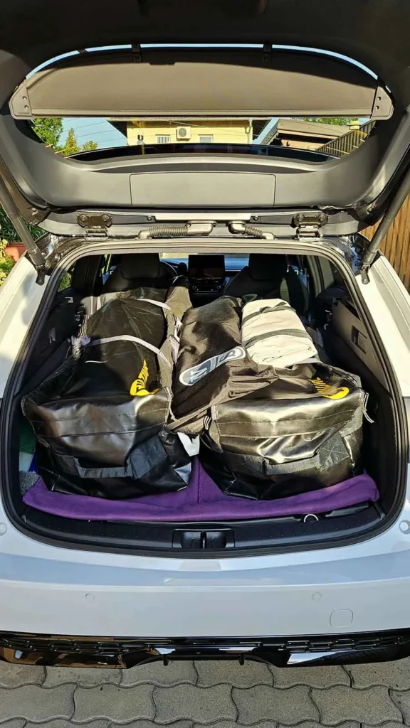 FAQ | How do Tiwal Captains Transport their Tiwal? | Tiwal sailing dinghy bags stowed in the boot of a Toyota Corolla Tiwal sailing dinghy bags stowed in the boot of a Toyota Corolla