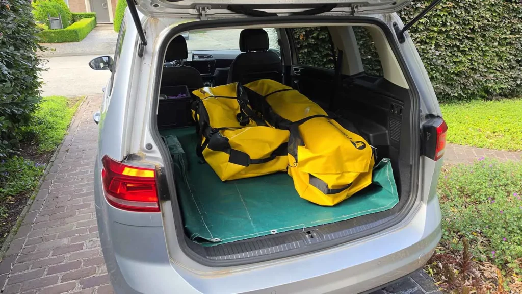 FAQ | How do Tiwal Captains Transport their Tiwal? |Tiwal sailboat bags stowed in a Volkswagen Touran Tiwal sailboat bags stowed in a Volkswagen Touran